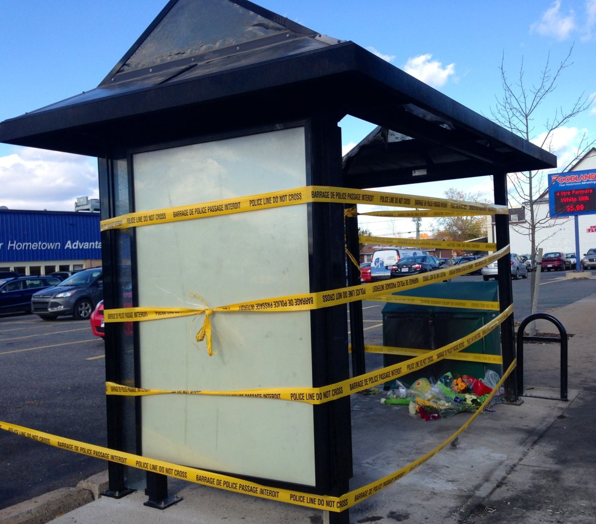 Police tape surrounds a burned bus stop in Berwick, N.S. where the body of homeless man Harley Lawrence was found on Oct. 23, 2013.