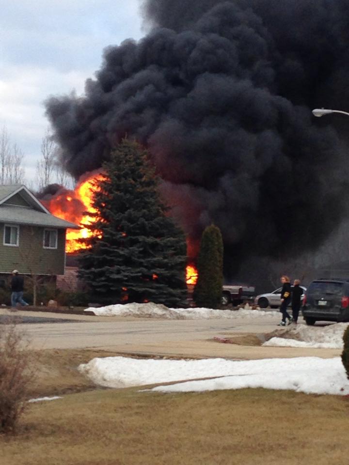 Crews rushed to a home in Lorette, Manitoba after an explosion and fire on April 19, 2014.