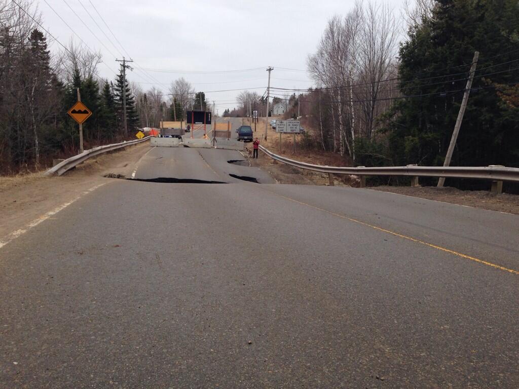 A section of Highway 114 in New Brunswick was closed due to sinkholes caused by flooding.