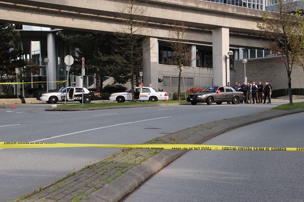 Police investigate after officer fires shots at a vehicle near Gateway SkyTrain station in Surrey. 