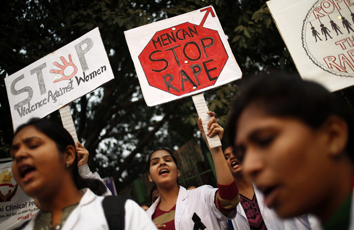 Indian physiotherapy students hold placards at a rally on Monday, Dec. 16, 2013. 