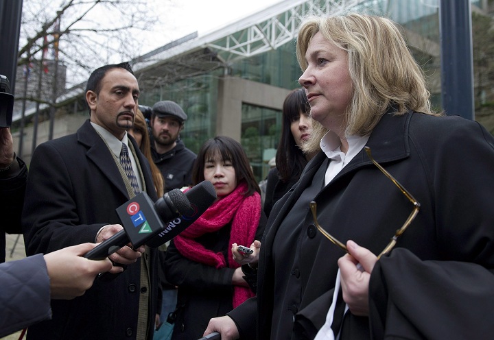 Crown Attorney Deborah Strachan speaks with reporters outside BC Supreme Court in Vancouver, BC, after the first court appearance for the mother and uncle of Jaswinder Kaur Sidhu who was murder in India in 2000, January 9, 2012. 