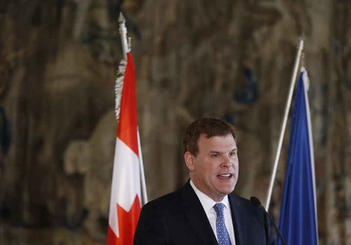 Canadian Foreign Affairs Minister John Baird answers questions to media during a press conference in Prague, Czech Republic, Tuesday, April 22, 2014. 