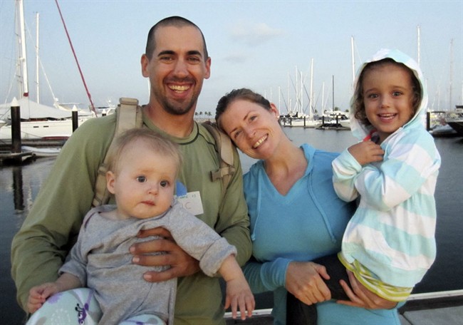 This undated image provided by Sariah English shows Eric and Charlotte Kaufman with their daughters, Lyra, 1, and Cora, 3. Rescuers have stabilized the condition Lyra, with her family on a crippled sailboat hundreds of miles off the coast of Mexico, and a U.S. Navy warship was headed toward the vessel, officials said Friday night, April 4, 2014. 