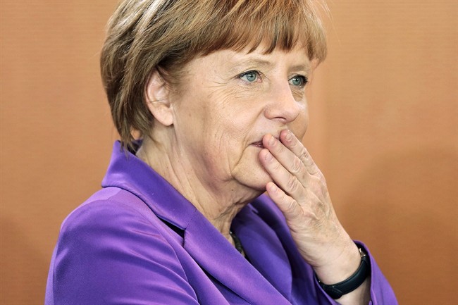 Germany's national cabinet moved to implement a national minimum hourly wage on Wednesday.