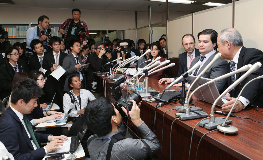 Mark Karpeles (second from right), president of Mt. Gox bitcoin exchange, speaks during a press conference in Tokyo in February. The troubled Bitcoin exchange filed for bankruptcy protection in Japan saying it had lost nearly half a billion dollars worth of the digital currency.