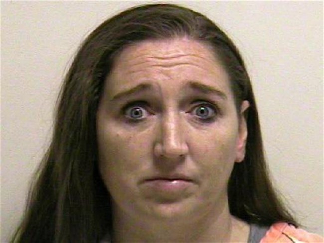 This photo provided by the Utah County jail shows Megan Huntsman, who was booked into the Utah County jail on suspicion of killing six of her newborn children over the past decade.