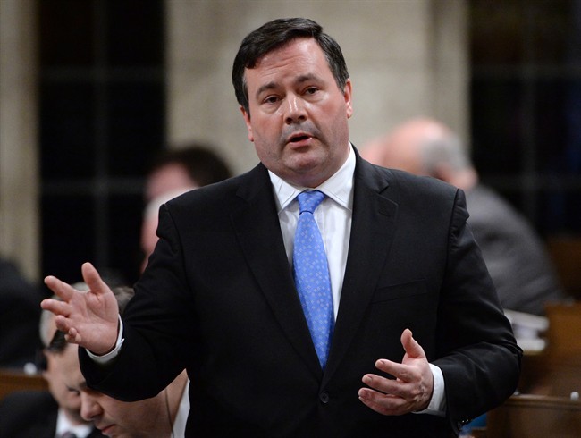 Minister of Employment and Social Development Jason Kenney responds to a question during question period in the House of Commons on Parliament Hill in Ottawa on Monday, April 28, 2014. 