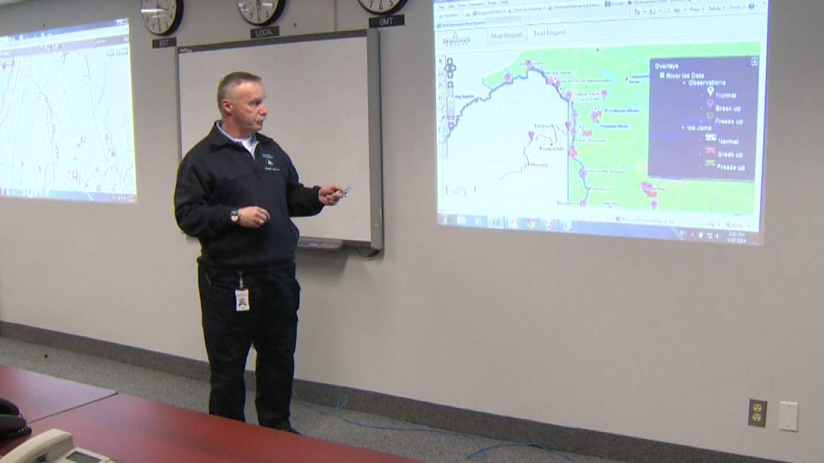 Greg MacCallum, Director of NB EMO, goes over map showing where ice jams could form along the St. John River.