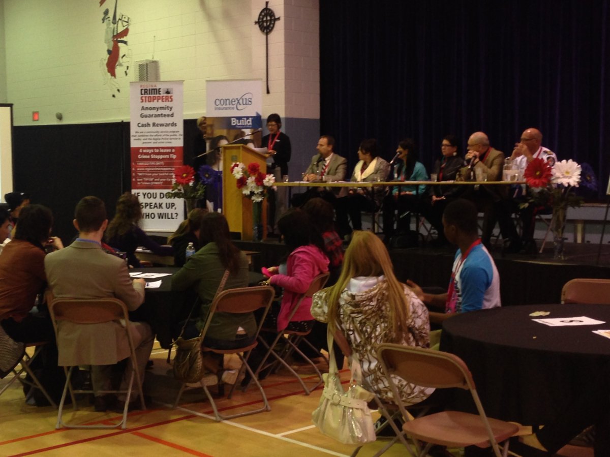Students ask tough questions to school officials and community leaders at Speak Out Regina.