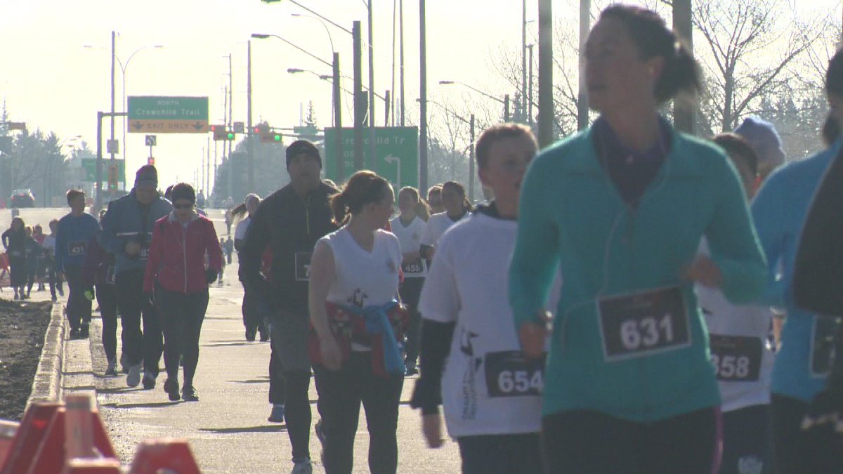 Thousands of runners and walkers participate in the 34th Annual Calgary Police Half Marathon.