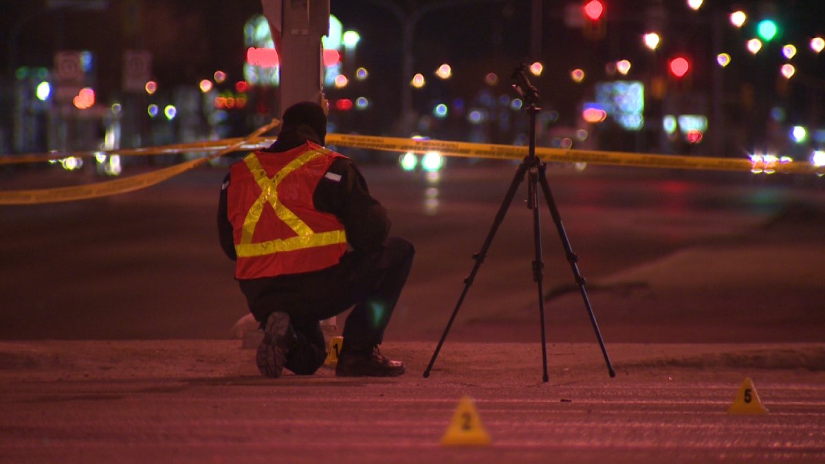 Police investigate the scene of a crash that killed a 17 year old male pedestrian at Regent Ave. and Lagimodiere Boulevard in Winnipeg on Wednesday, April 16, 2014.