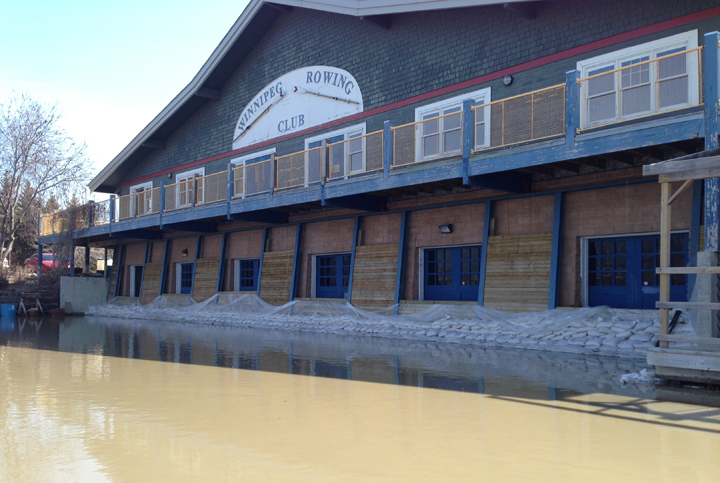 Red River flood water is held at bay by sandbags at the Winnipeg Rowing Club on Tuesday.