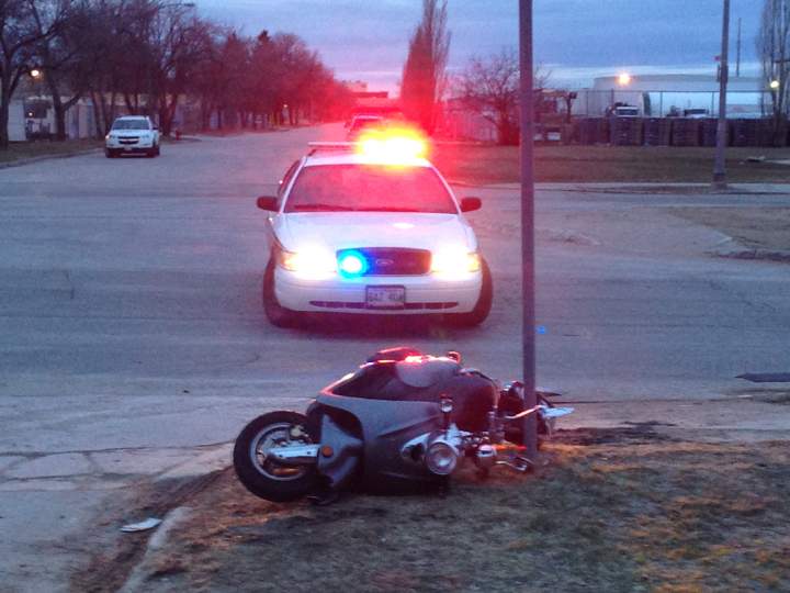 A scooter knocked down a post at the intersection of Inkster Boulevard and Fife Street on Wednesday morning.