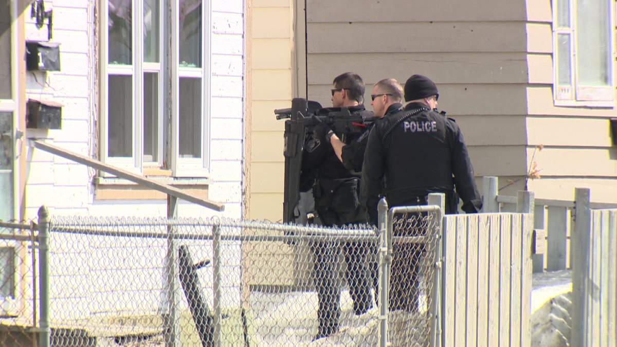 Police had a home on Selkirk Avenue surrounded late Sunday morning.