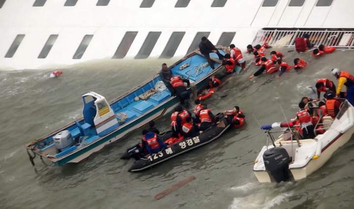 In this image taken from video from Mokpo Coast Guard, passengers are rescued by South Korean Coast guard.