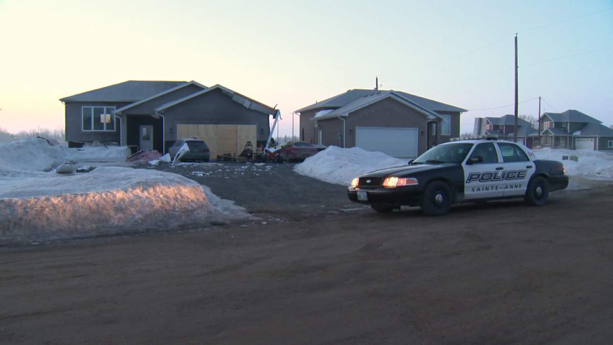 Police say an explosion at this Ste. Anne house Sunday afternoon was caused by butane used to produce drugs.