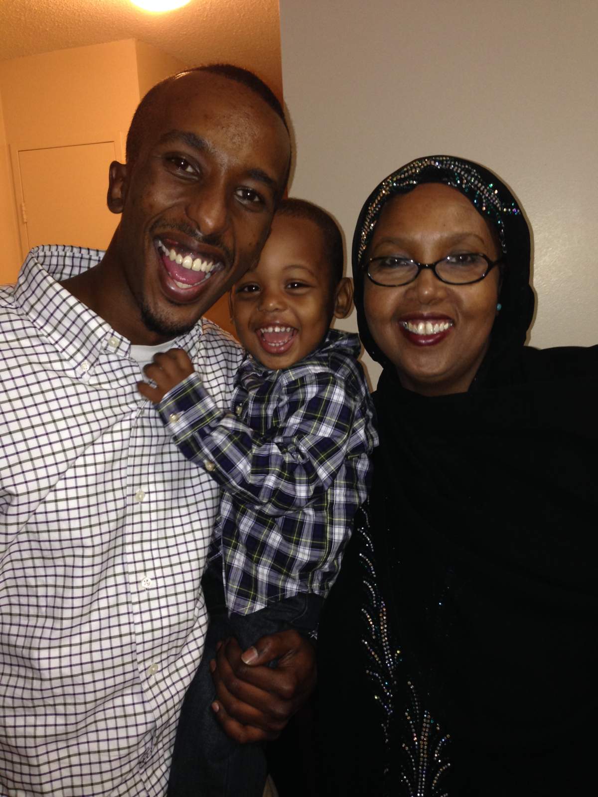 Suryan Giama with his mother and son.