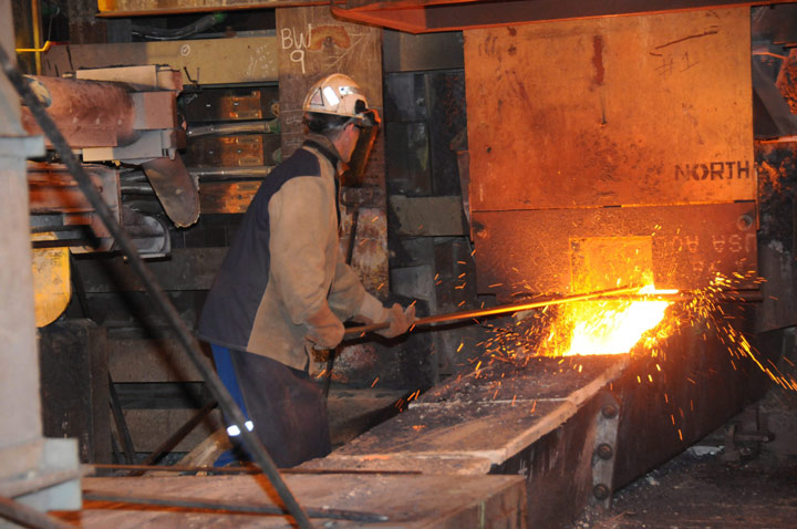 A tapper taps nickel-copper matt in the flash furnace of Vale SA smelter complex in Copper Cliff, Ont. in this December 8, 2010 file photo. 