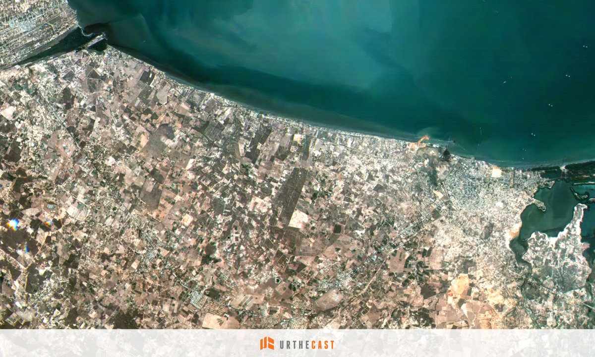 One of two images taken using Urthecast's Theia medium-resolution aboard the International Space Station shows the urban area surrounding Santa Cruz de Mara, Venezuela.