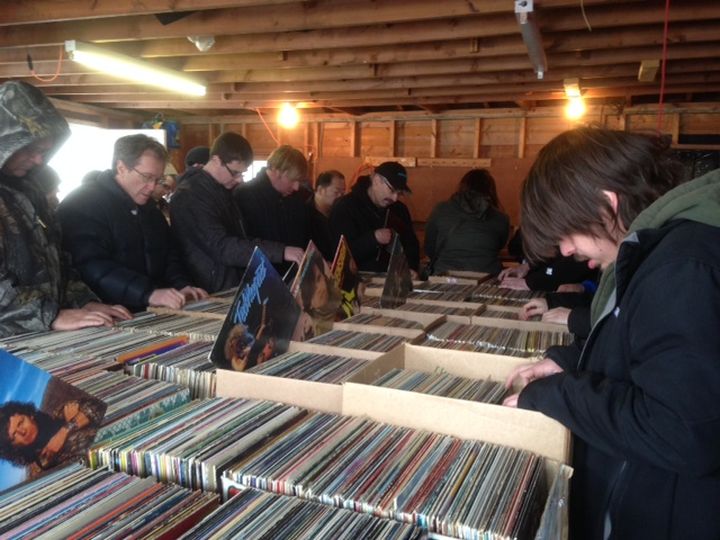 People search through hundreds of records at an Edmonton garage sale. Garage sales are in full swing in Saskatoon and for those holding them, there are a few bylaws to remember.