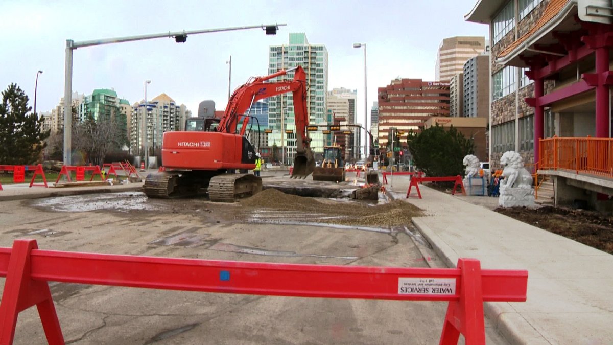 Crews work to repair a water main break at 4th Avenue at 9th Street S.W. on Wednesday, April 23rd, 2014. 