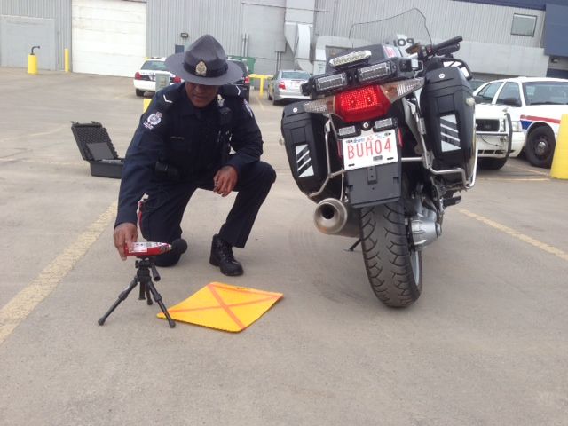 EPS officer tests a motorcycle for noise violations May 21, 2014.