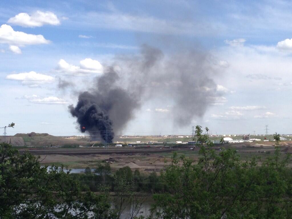 Smoke can be seen in northeast Edmonton, May 24, 2014.