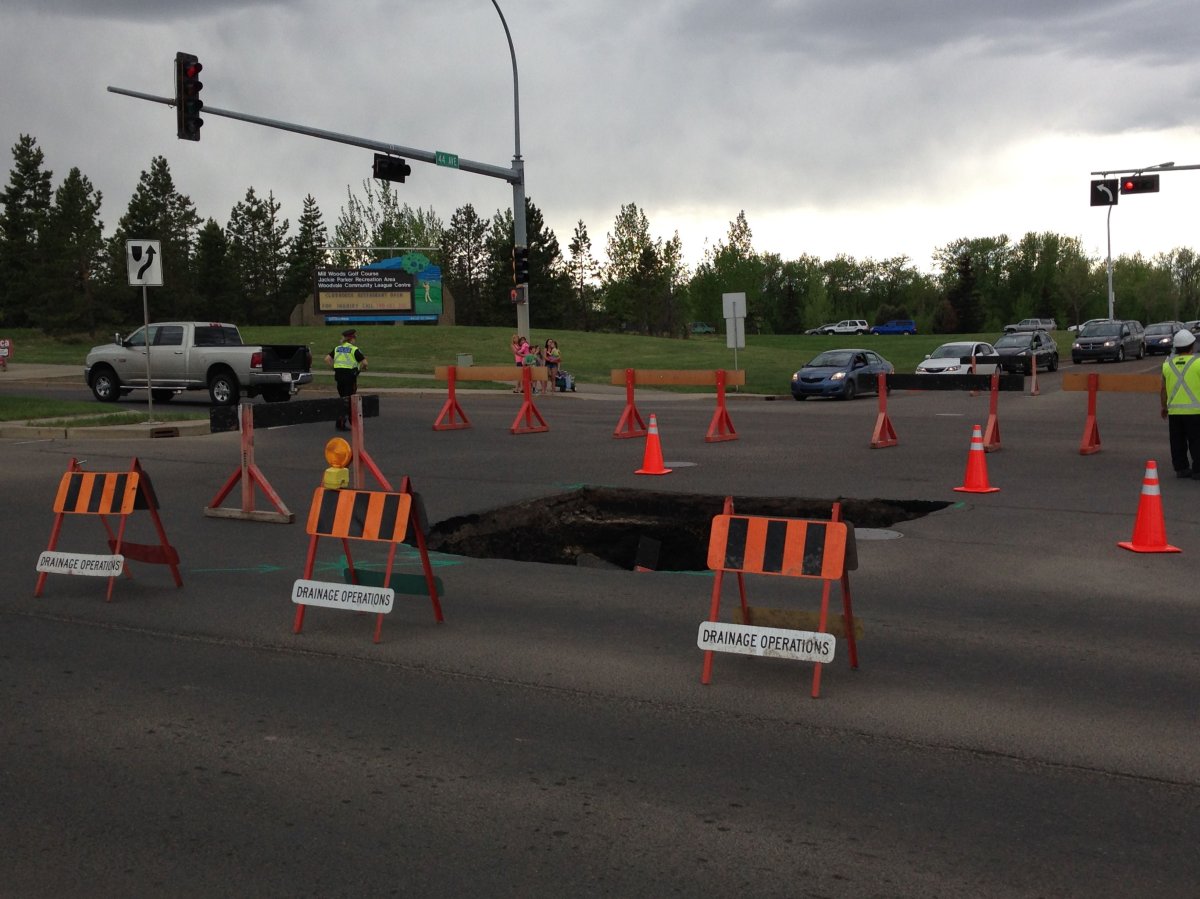 A large sinkhole opened up at the intersection of 50 Street and 44 Avenue in Edmonton, May 24, 2014.