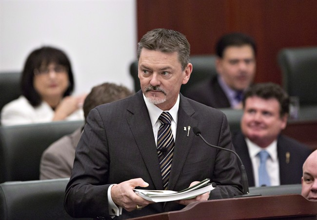 Albert President of Treasury Board and Minister of Finance Doug Horner delivers the budget in Edmonton, Alberta on Thursday March 6, 2014. Horner says he won't seek the leadership of the governing Progressive Conservatives.