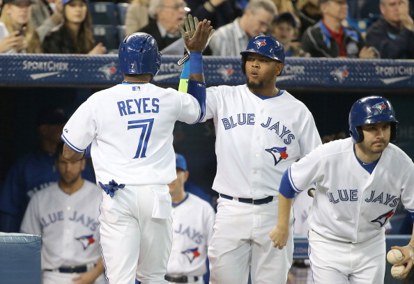Edwin Encarnacion hit two of Toronto's season-high five home runs as the Blue Jays capped a two-game mini-sweep of Philadelphia by outscoring the Phillies 12-6 on Thursday at Rogers Centre.