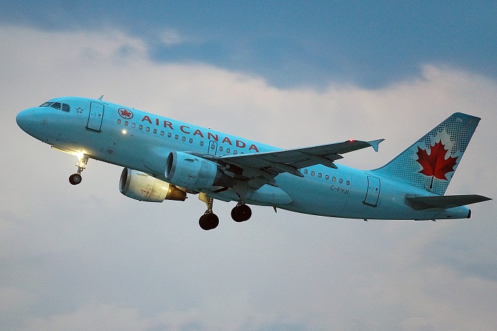 An Air Canada passenger jet leaving the tarmac at Trudeau International airport, Montreal, July 10, 2013.