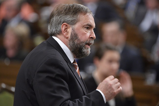 NDP Leader Tom Mulcair asks a question during Question Period in the House of Commons on Parliament Hill in Ottawa, Tuesday May 27, 2014 .