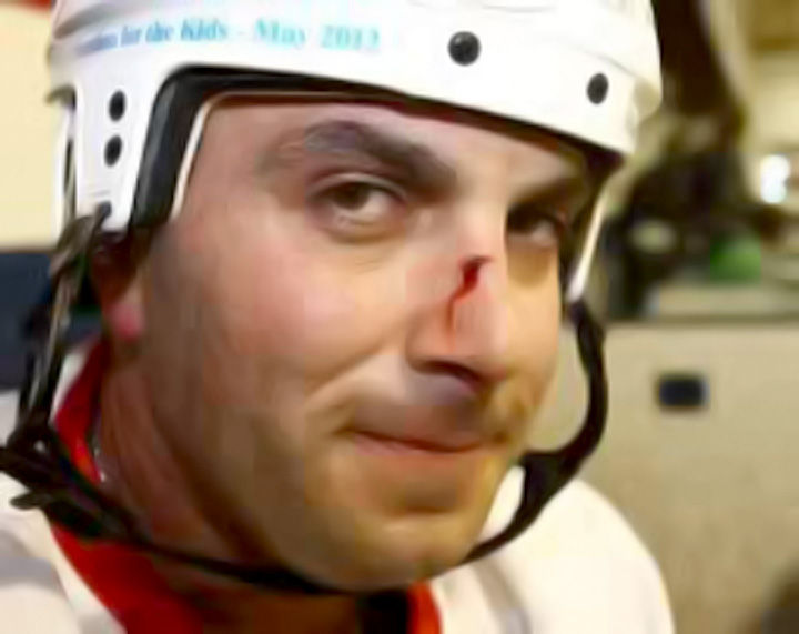 Player Alex Halat at the World’s Longest Hockey Game in Chestermere AB in 2012.