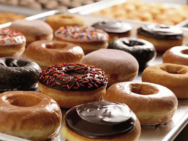 Daydreaming of donuts after a sleepless night? New research pinpoints how much we overeat when we're sleep-deprived. Hint: it's a lot of extra calories.