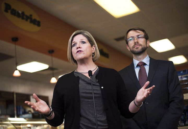 NDP of Ontario Leader Andrea Horwath speaks to media as NDP York West candidate Tom Rakocevic looks on at Nina D'Aversa Bakery in Toronto on Monday May 19, 2014.