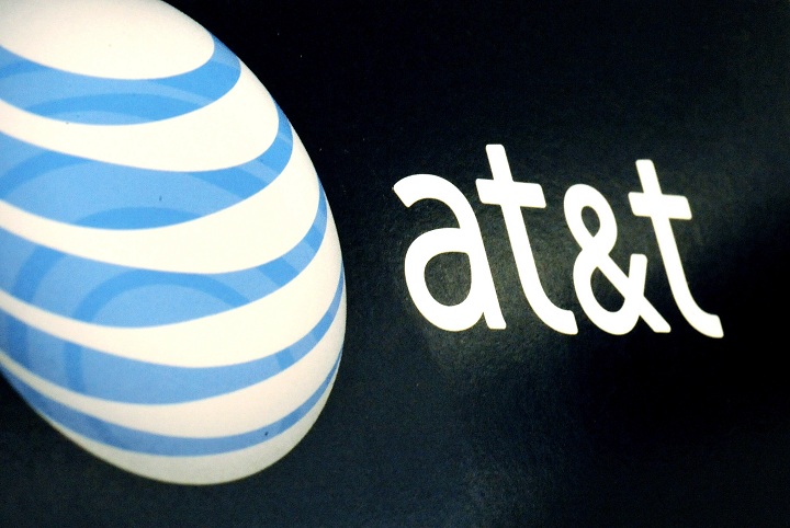 In this Oct. 19, 2009 file photo, the AT&T logo is on display at a store in Gloucester, Mass. 