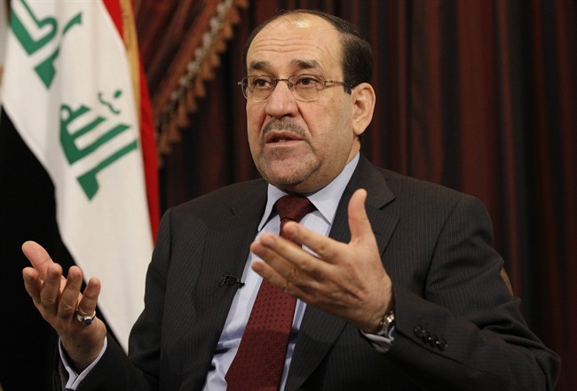 File -- In this Saturday, Dec. 3, 2011 file photo, Iraq's Shiite Prime Minister Nouri al-Maliki is seen during an interview with The Associated Press in Baghdad, Iraq.