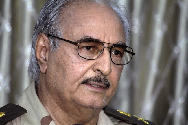 In this Saturday, May 17, 2014 photo, Libyan Gen. Khalifa Hifter addresses a press conference in Benghazi, Libya. 