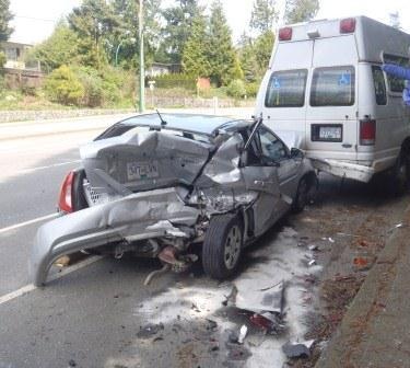 Driver reaching for cell phone causes four vehicle crash in North Vancouver - image