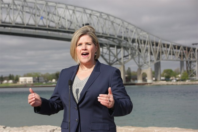 Ontario NDP Leader Andrea Horwath is seen on the election campaign trail in Sarnia, Ont., on Friday, May 16, 2014. Horwath pledged lower electricity rates if elected June 12. 