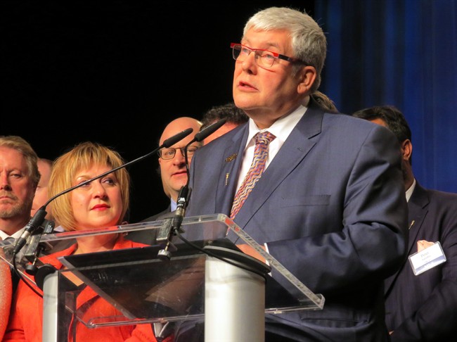 Dave Hancock, surrounded by his caucus team, made his first formal speech as premier to Progressive Conservative members at a party fundraiser in Edmonton Thursday May 1, 2014. Without mentioning former premier Alison Redford by name, Hancock apologized to the crowd for errors made during her time as premier. Hancock said the party strayed from its core values but will prove itself again through future policies and practices. 
