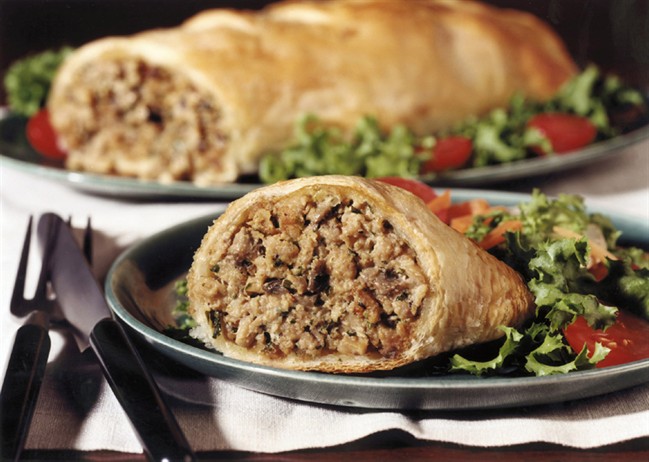 The addition of mint gives these sausage and mushroom rolls an unusual and fresh taste. They can also made in a smaller size and served as appetizers.