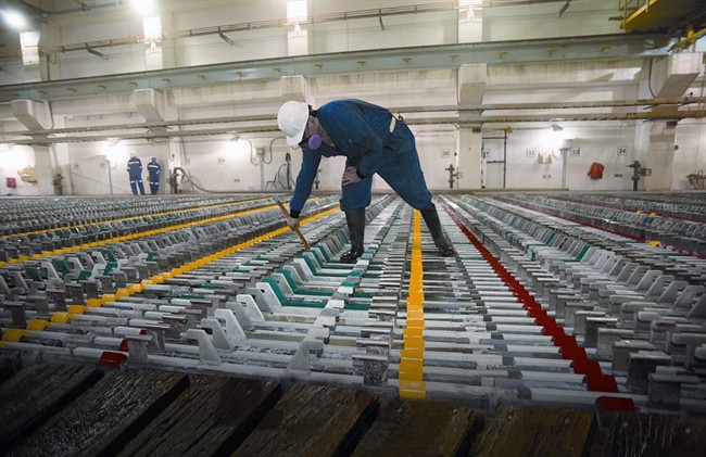 An employee works at Hudbay's zinc plant in Flin Flon, Man.