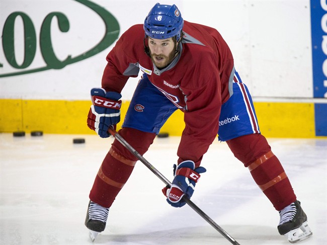 FILE PHOTO: Montreal Canadiens' Brandon Prust takes a shot during practice.