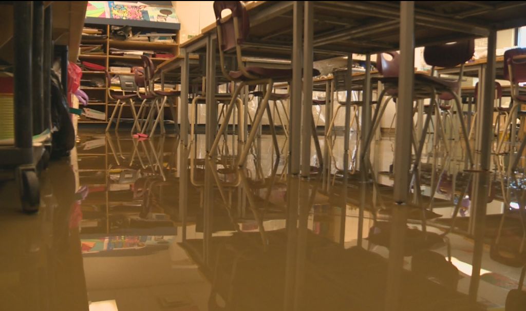 Flooding caused by a water main break at École Secondaire Sainte Marguerite d'Youville in St. Albert; May 13, 2014.