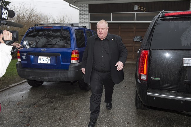 Toronto Mayor Rob Ford leave his home early Thursday May 1, 2014. THE CANADIAN PRESS/Frank Gunn.
