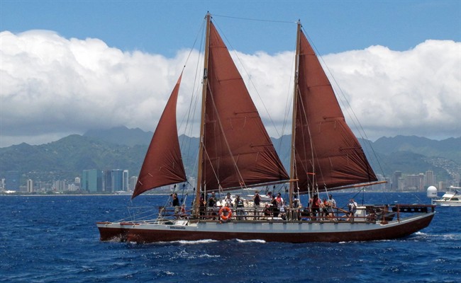 The Hikianalia sailing canoe is seen off Honolulu Tuesday, April 29, 2014.The modern sister vessel plans to accompany the Hokulea, a Polynesian voyaging canoe, on a 3-year voyage around the world, navigating using no modern instrumentation. 