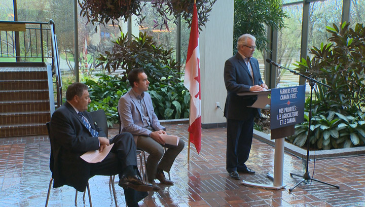 Federal Agriculture Minister Gerry Ritz (right) announced on Monday the Canadian Agriculture Adaptation Program will be renewed for another five years to help the agriculture sector.