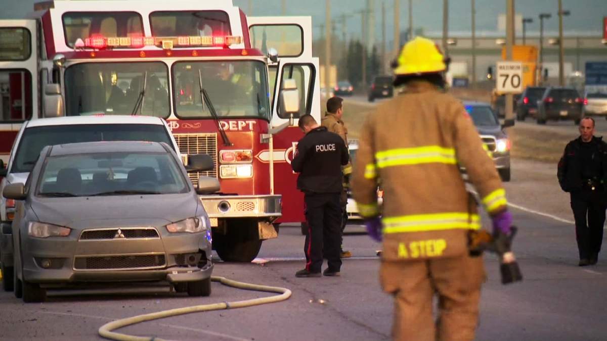 Emergency crews respond to a fatal two vehicle collision on 68th Street and Glenmore Trail S.E. on Friday, May 9th, 2014.